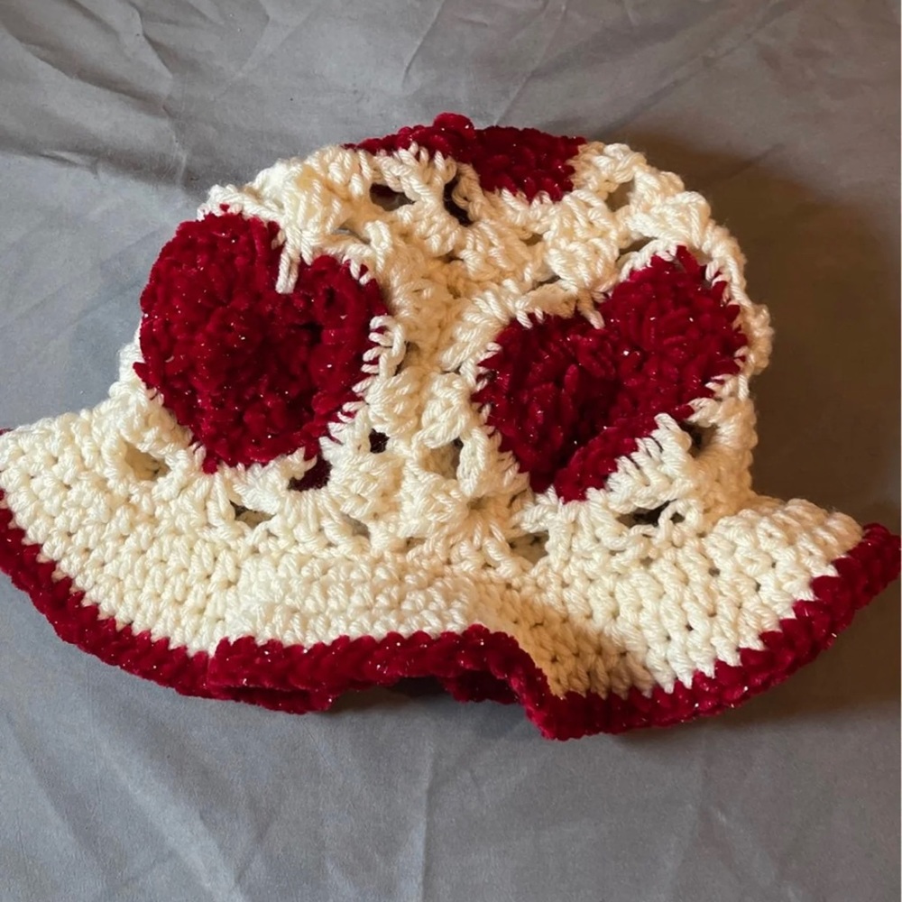 Crochet&knitted hats,dolls,blankets,and apparel.